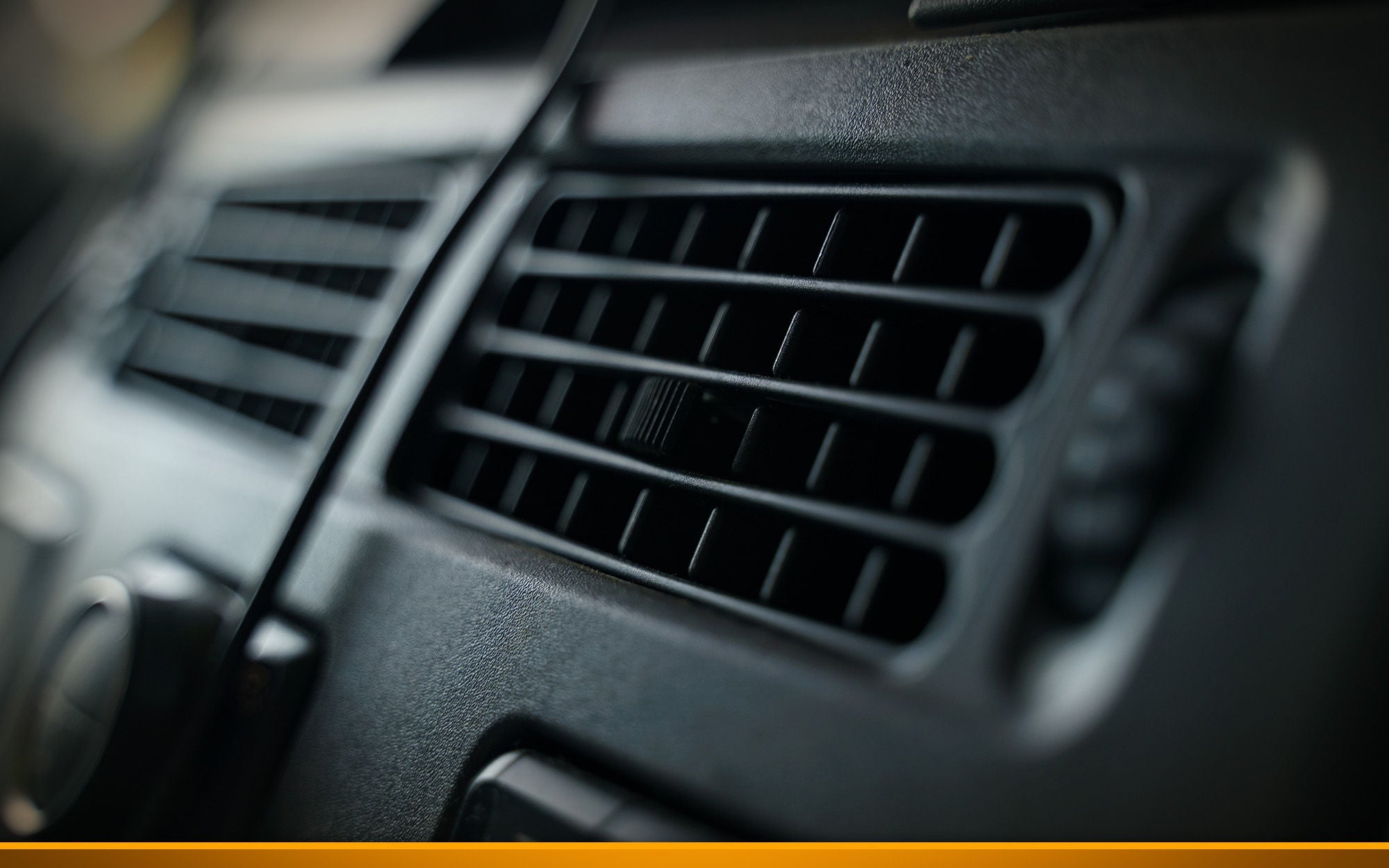 The background image of the control elements of the blower and air conditioning system of a truck
