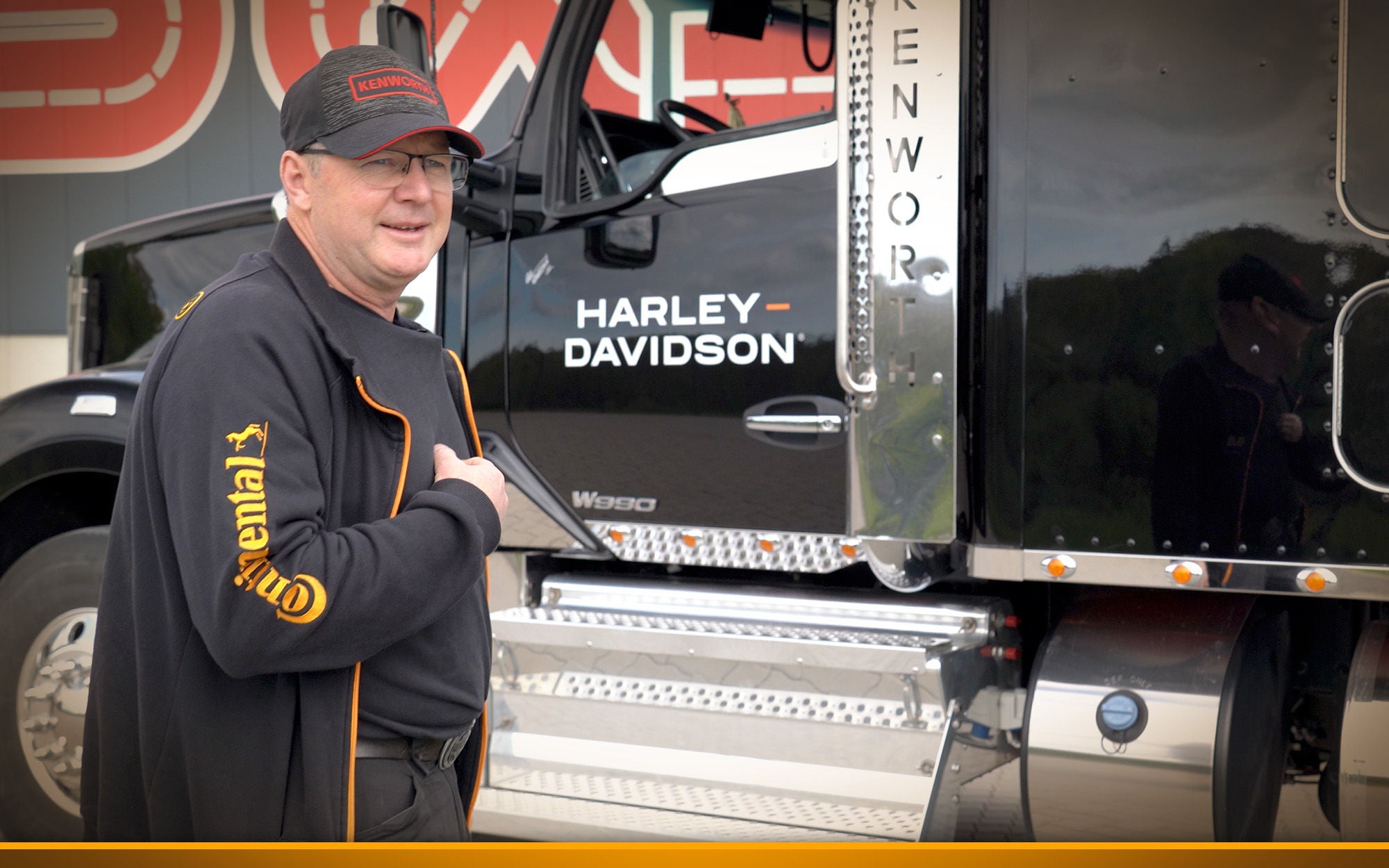 Man in front of American Truck