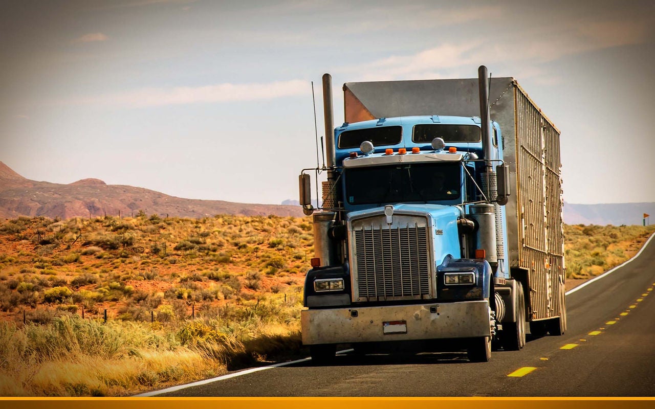 Truck at desert highway