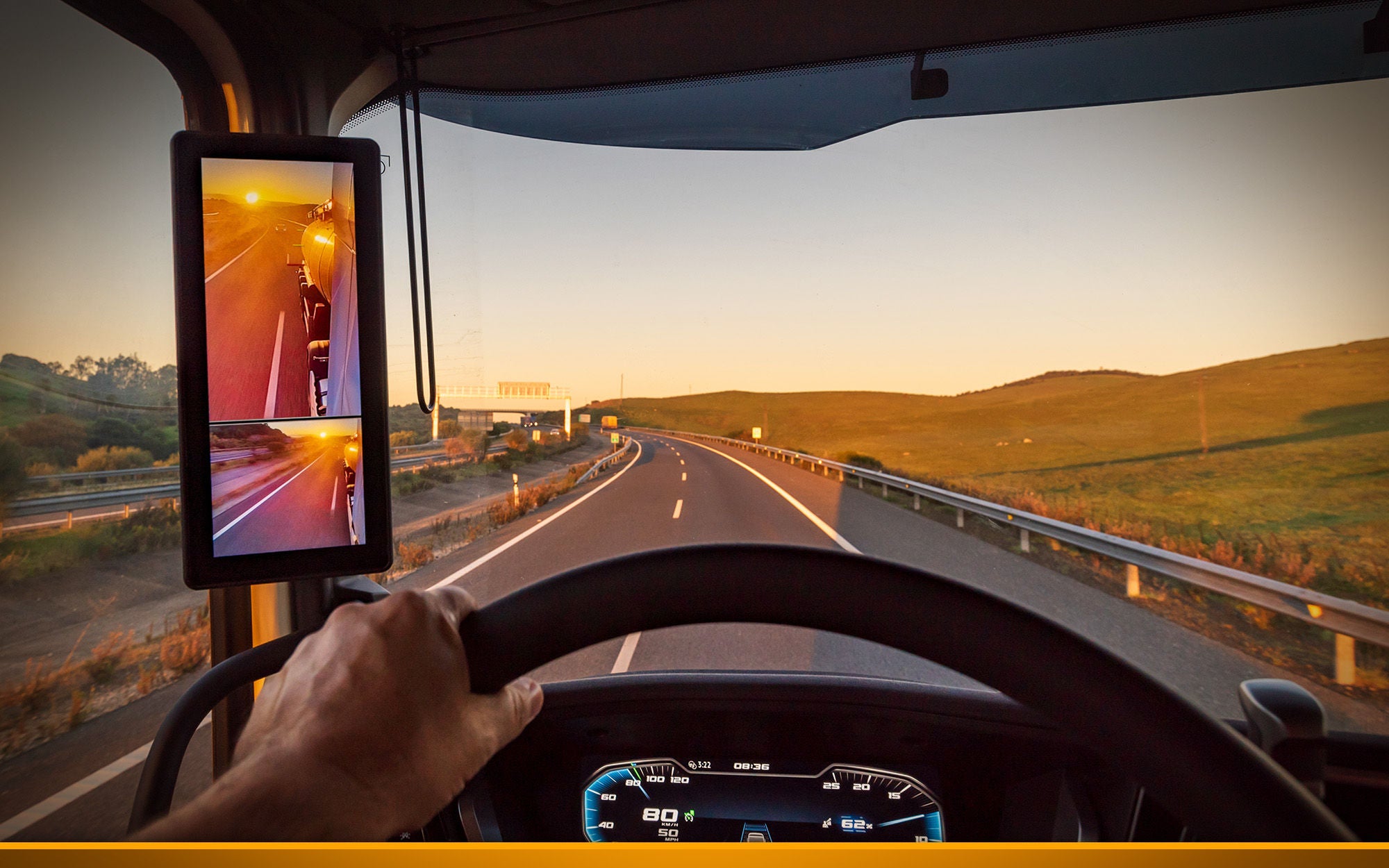 Point of View of a trucker on a beautiful road with a sunset