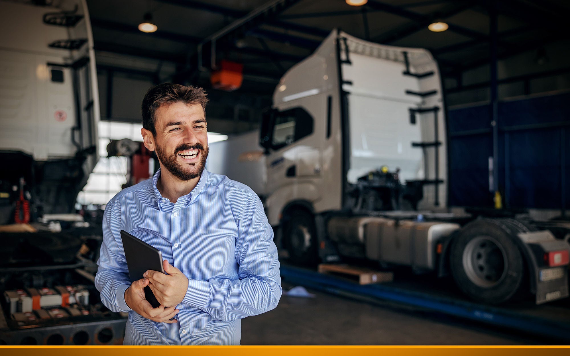 men in front of trucks