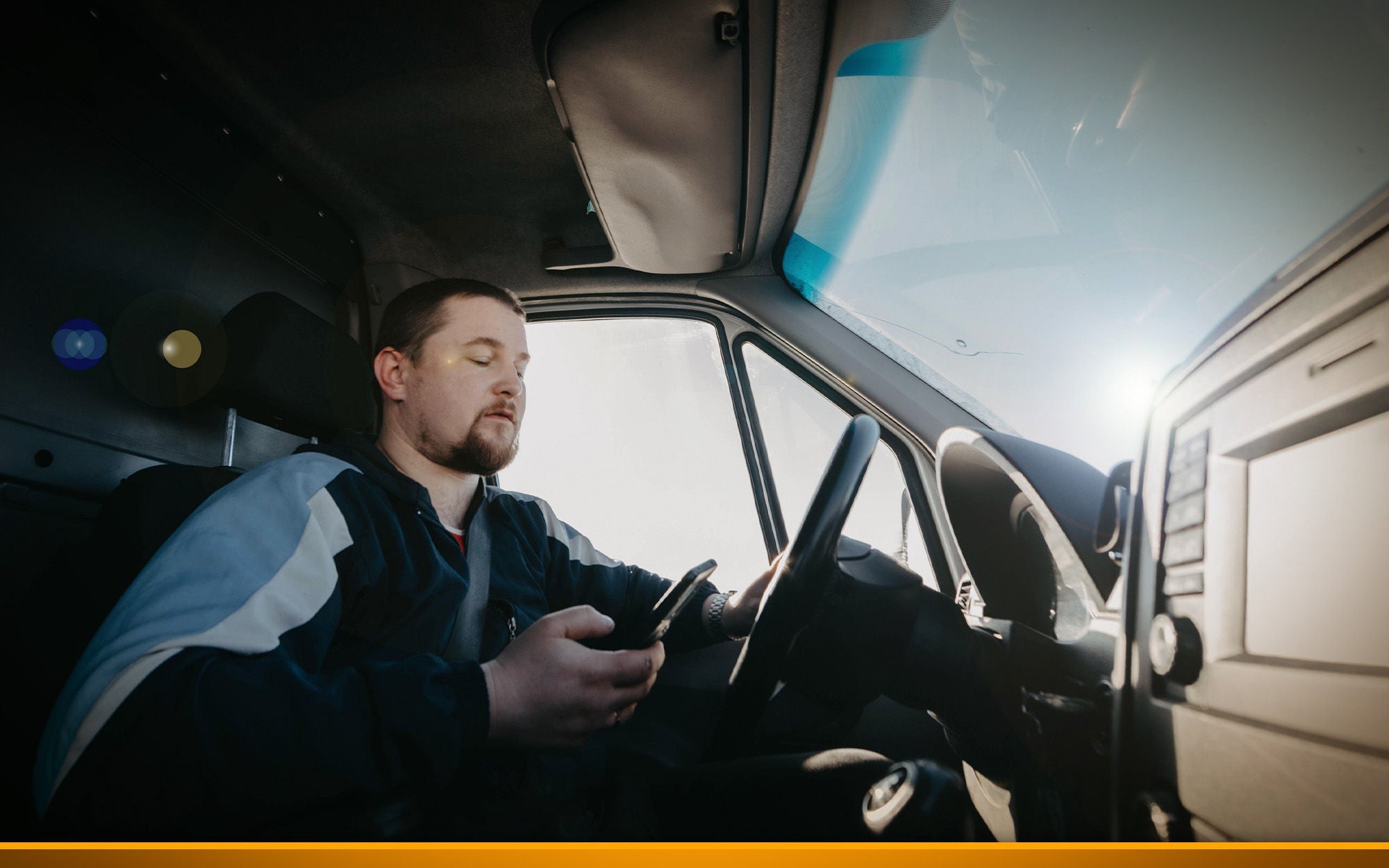 Truck driver on smartphone while driving