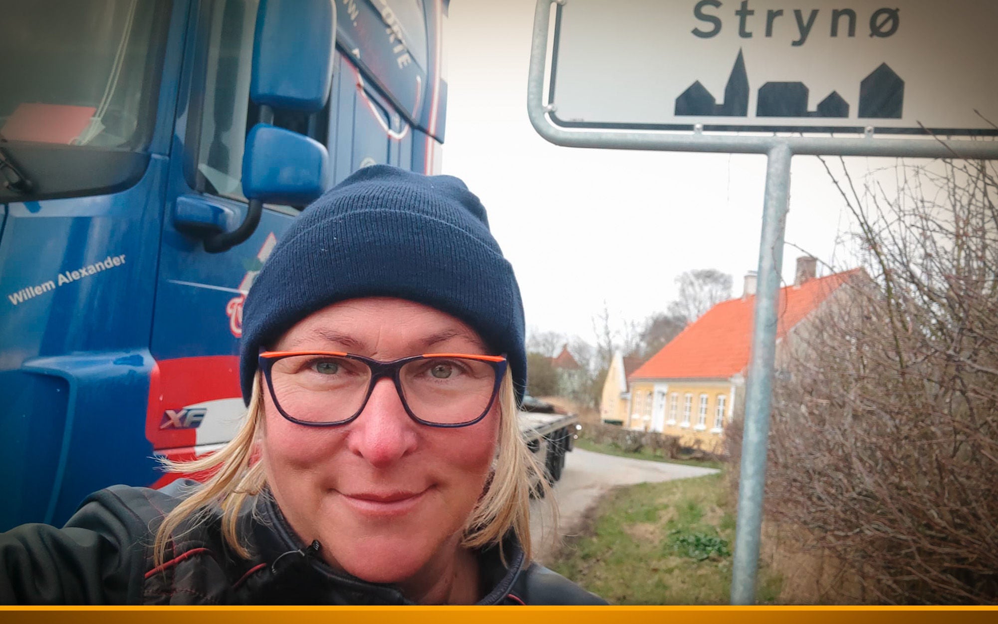 Woman in front of a truck