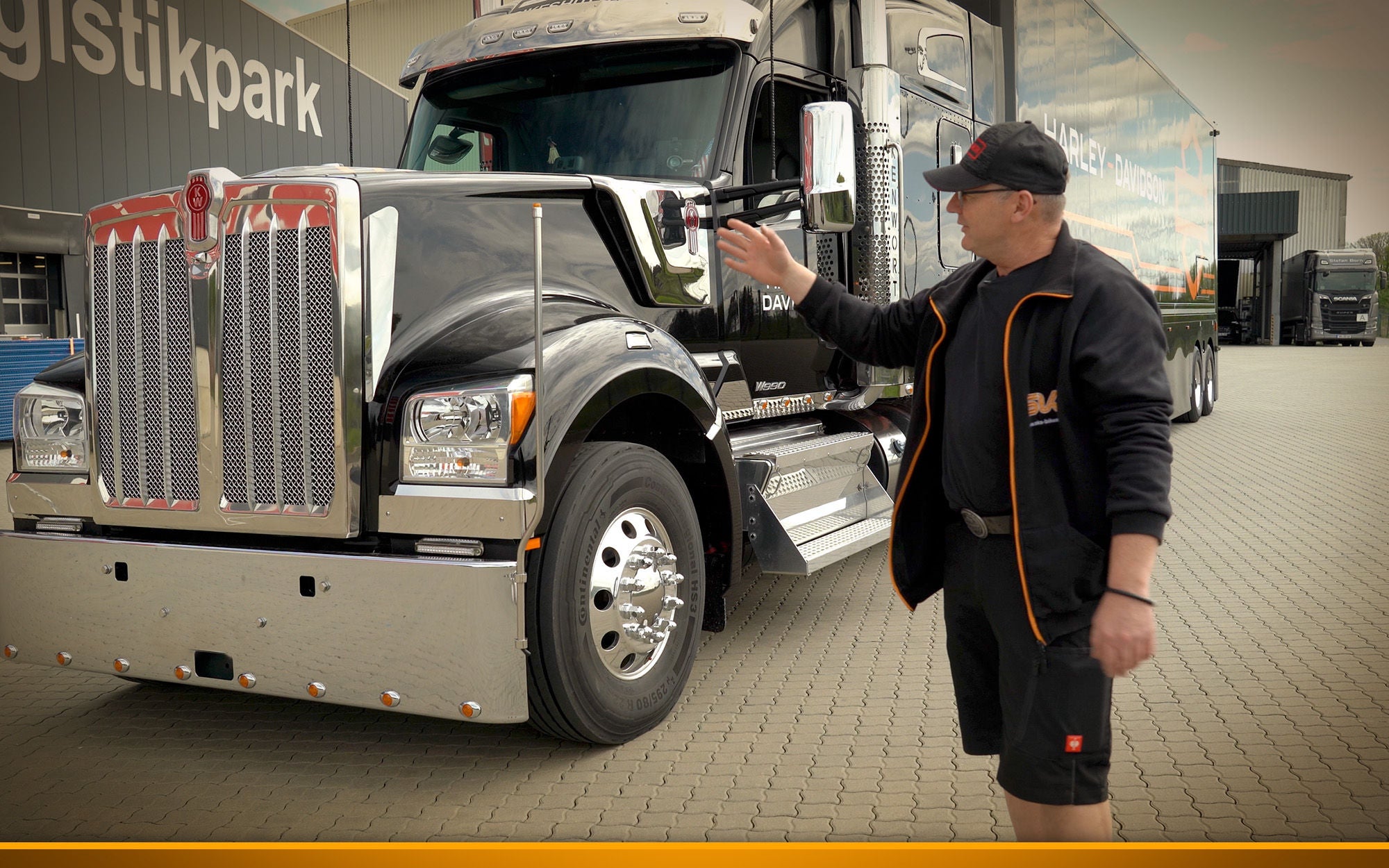 Man in front of American Truck