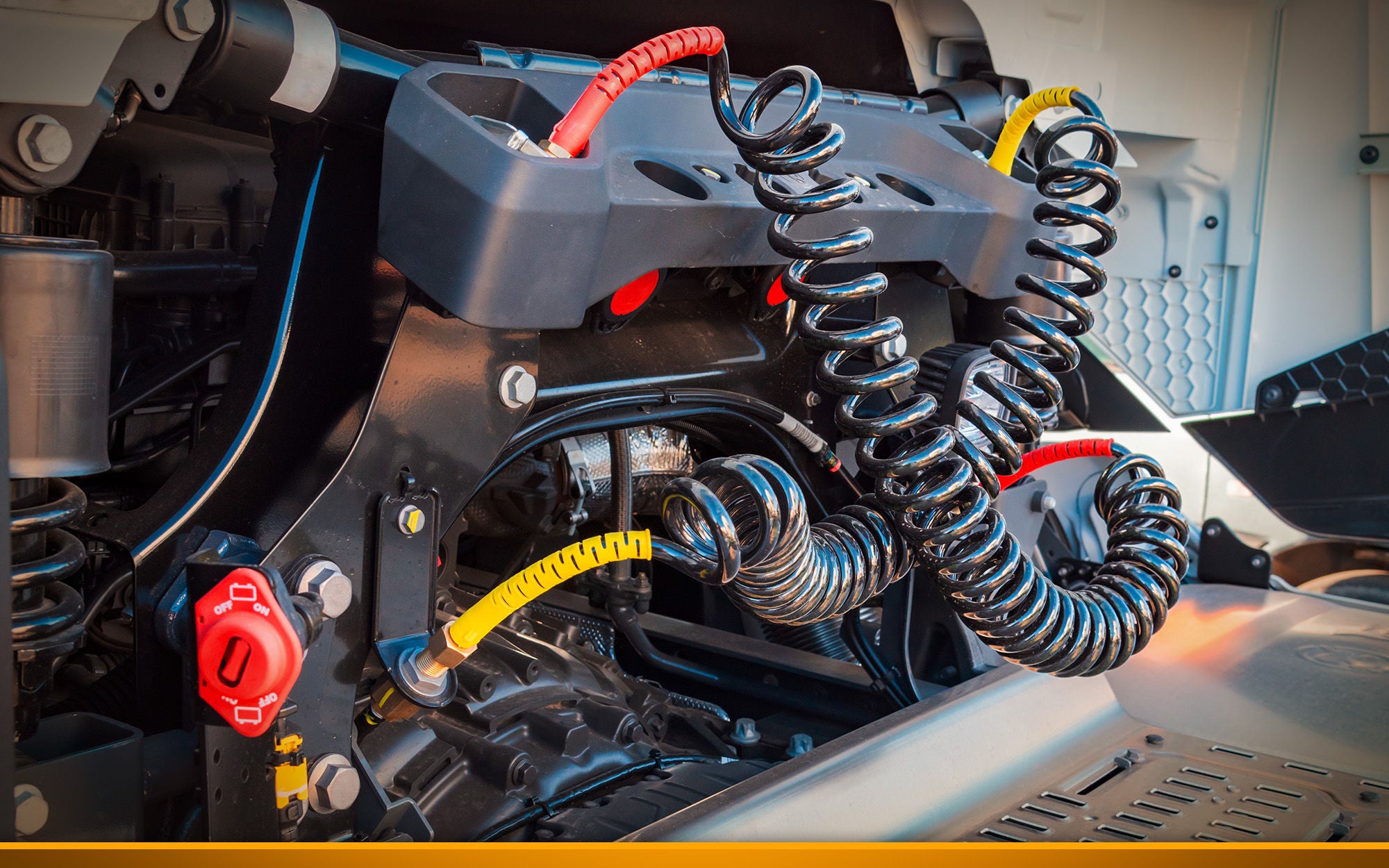 Truck air hoses to connect the air pressure to the semi-trailer, red for direct air and yellow for brakes. 