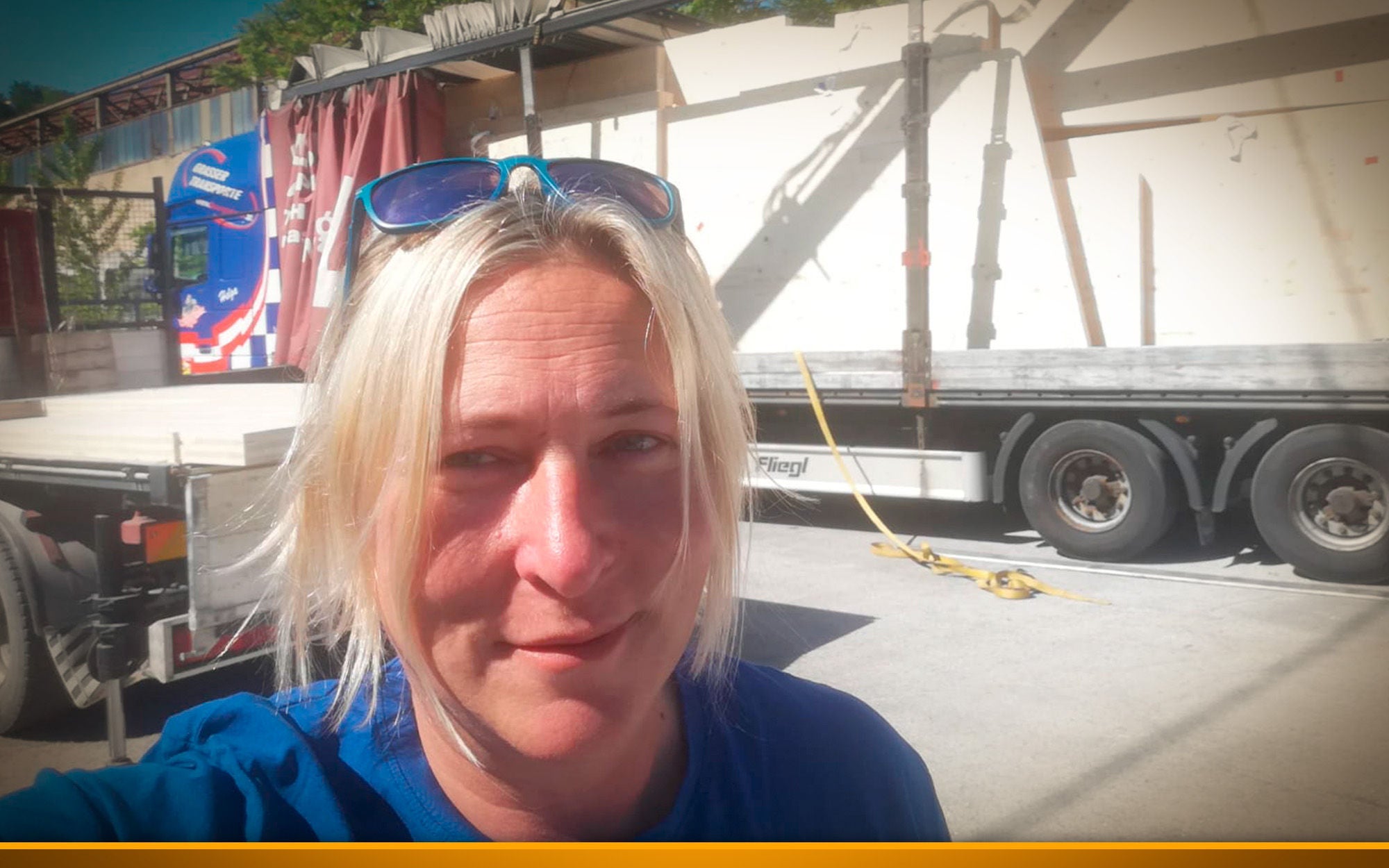 woman in front of truck