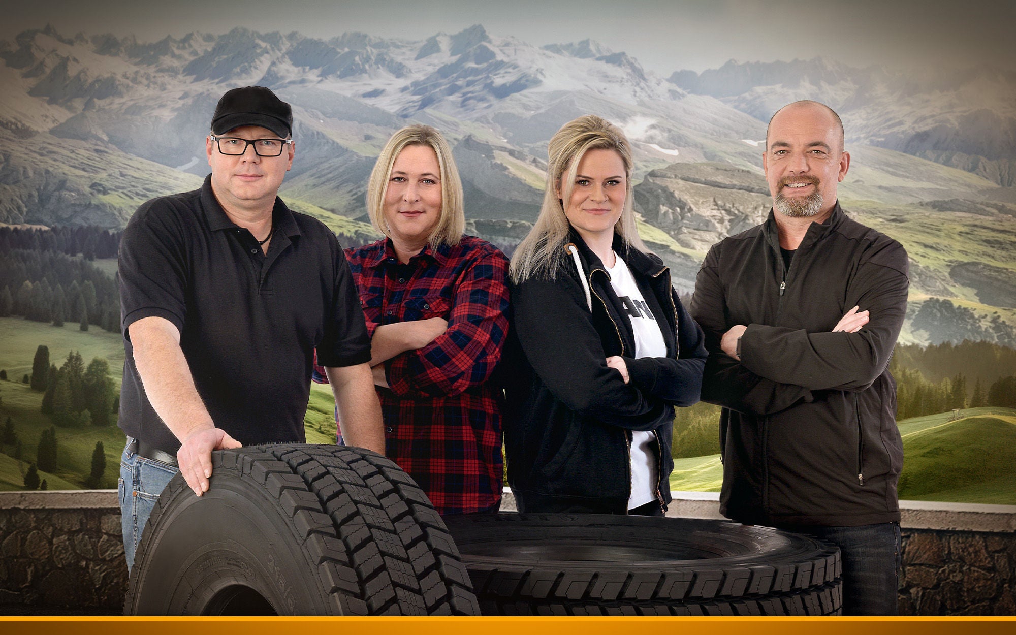 People standing behind tires