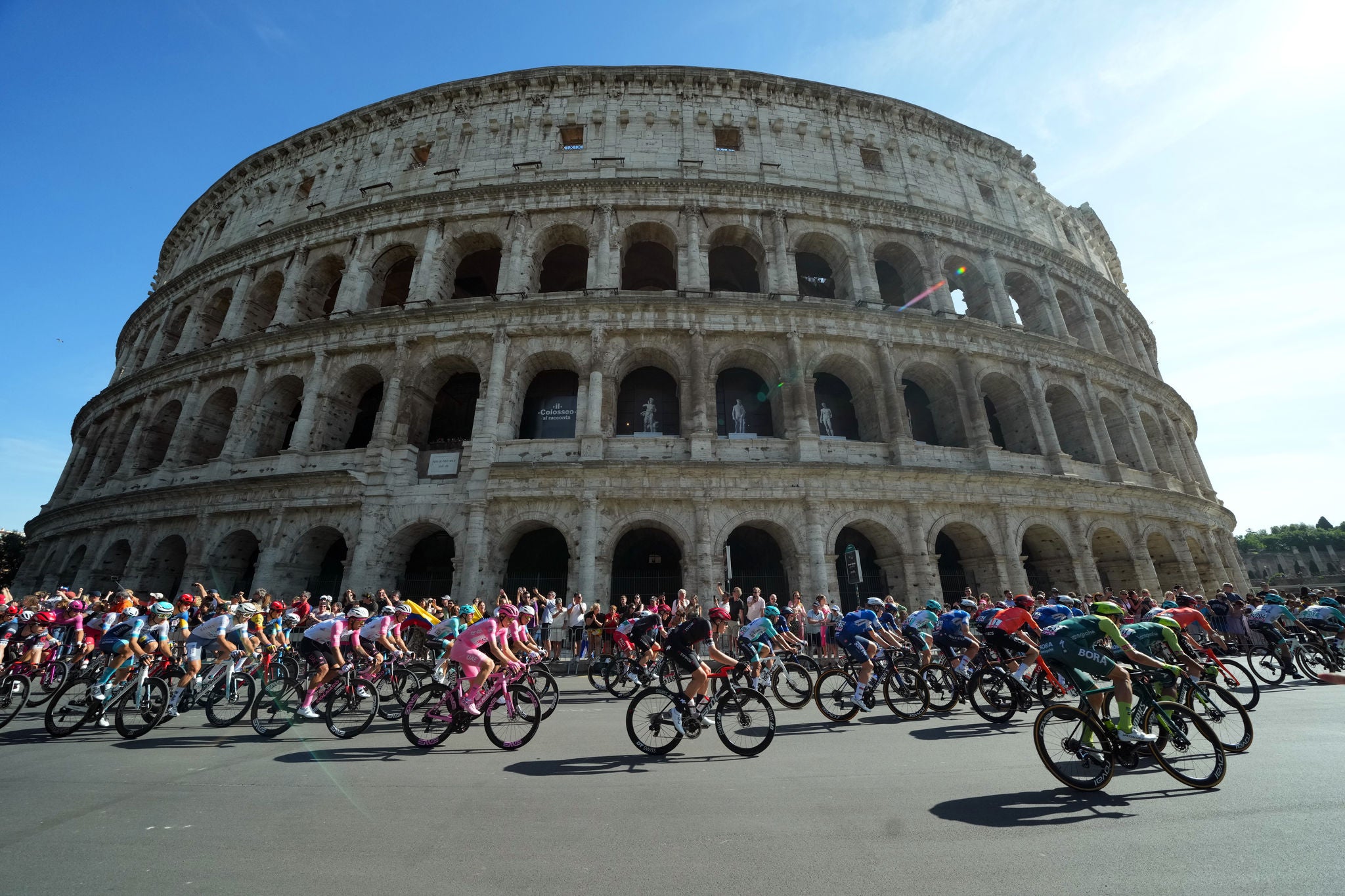 The pack rides in front of the colosseum during the stage 21 of the of the Giro d'Italia from Rome to Rome, Italy. Sunday, May 26, 2024 Sport cycling (Photo by Gian Mattia D'Alberto/Lapresse)