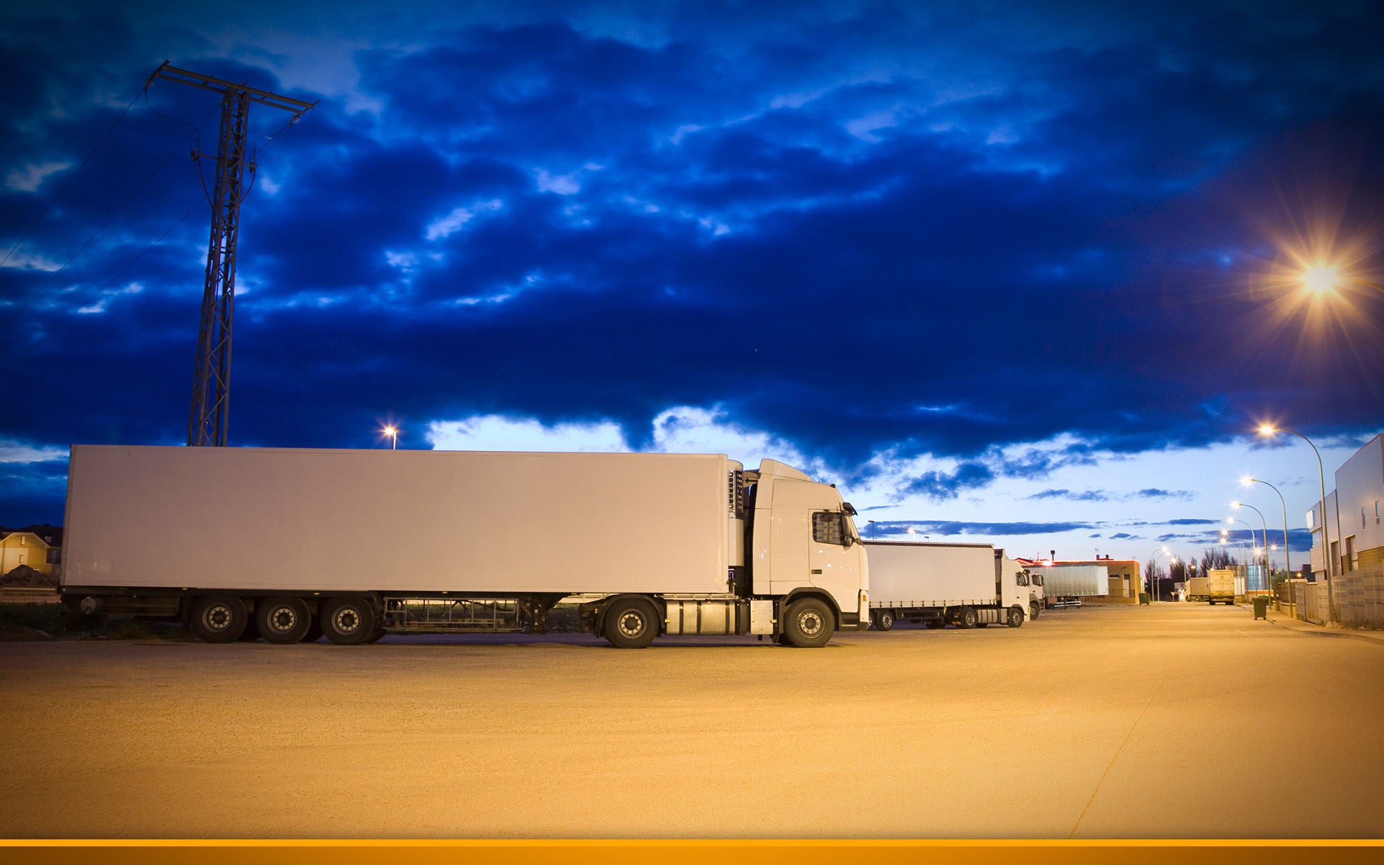 Trucks at night on a parking