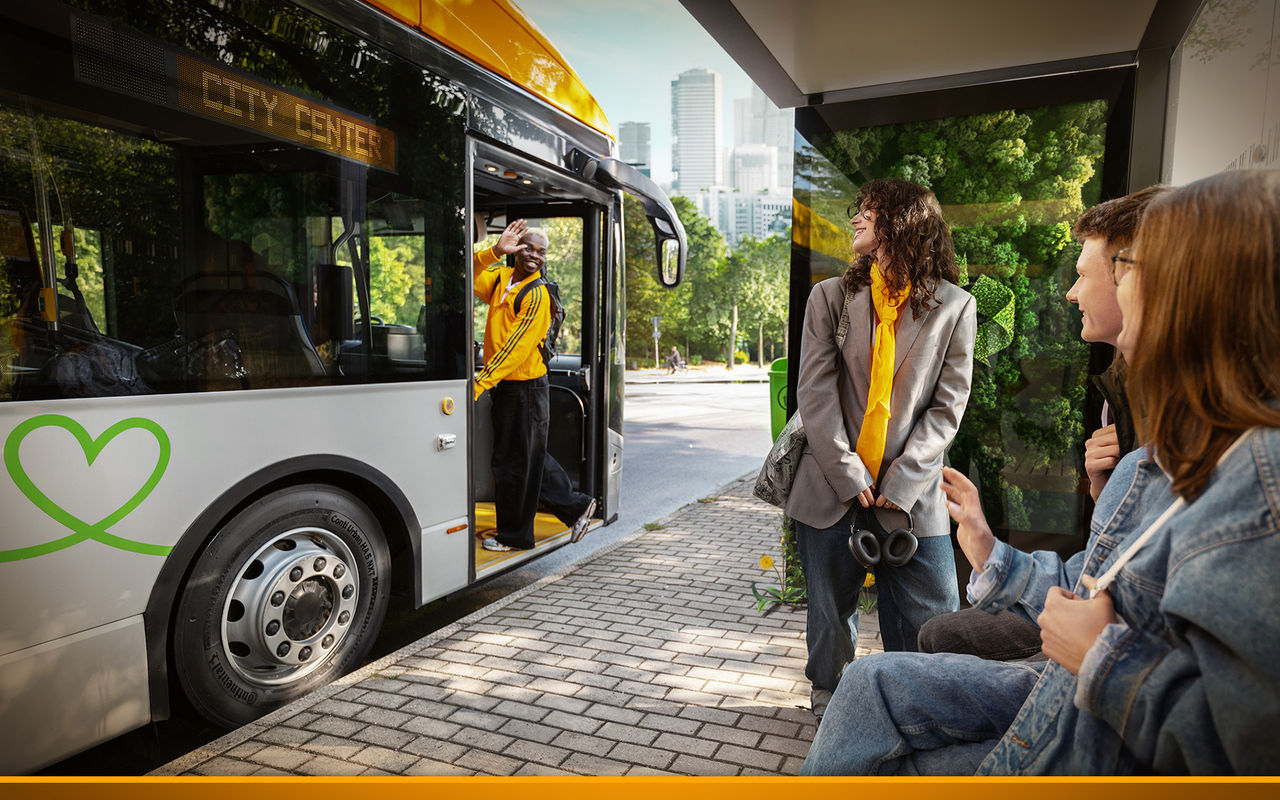 Bus driver greeting passengers at a city bus stop while people wait and smile on the sidewalk