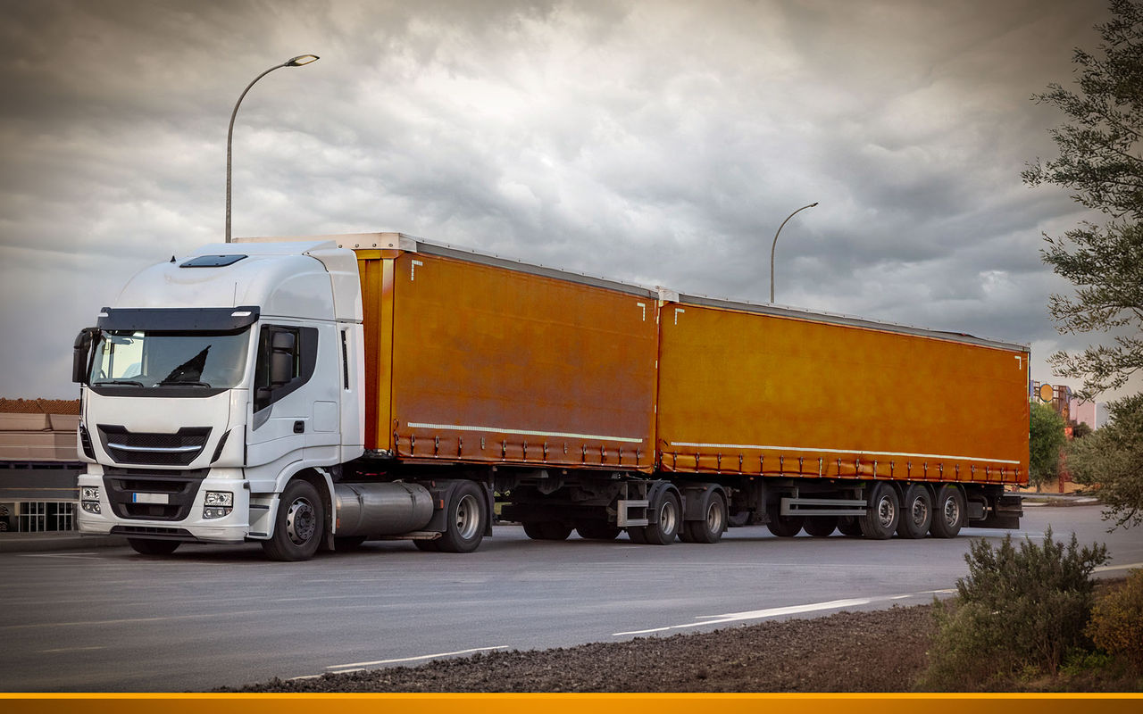 Mega truck or duo trailer, a set of a truck with two semi-trailers. 
