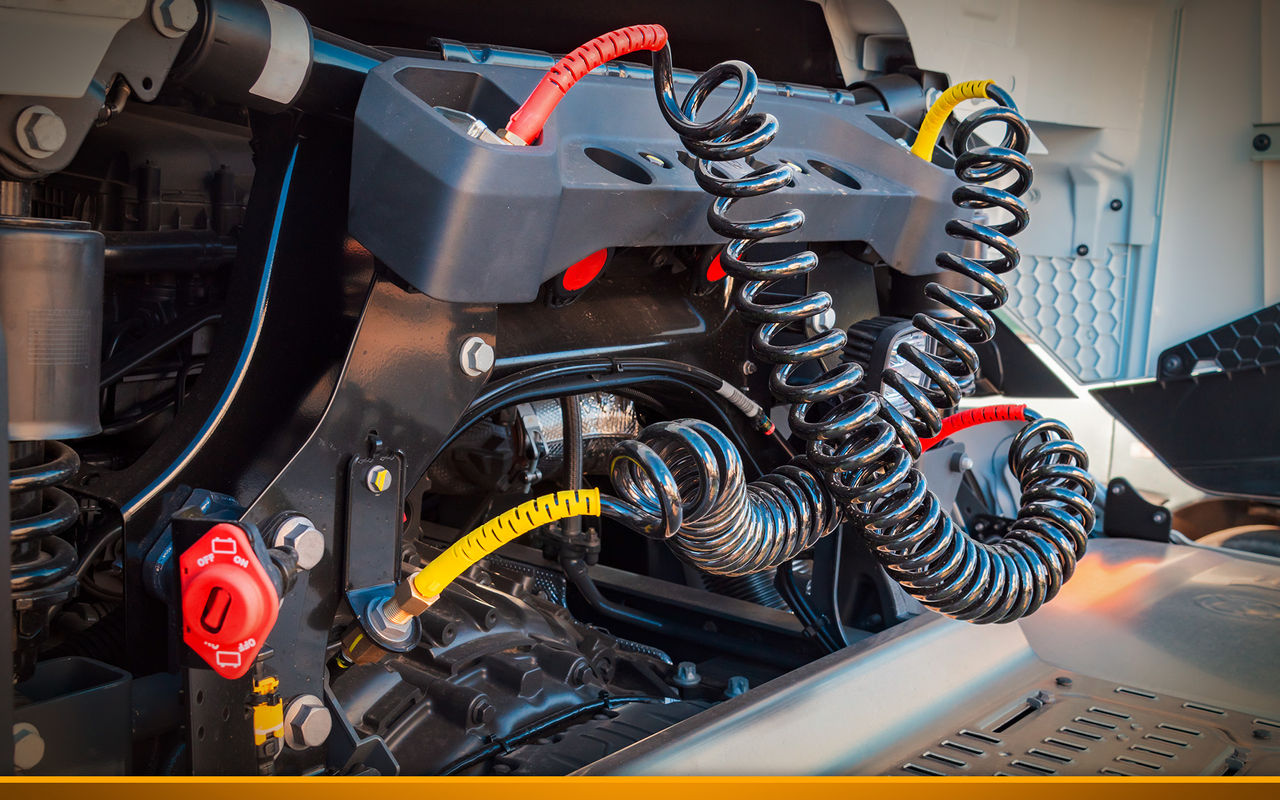Truck air hoses to connect the air pressure to the semi-trailer, red for direct air and yellow for brakes.