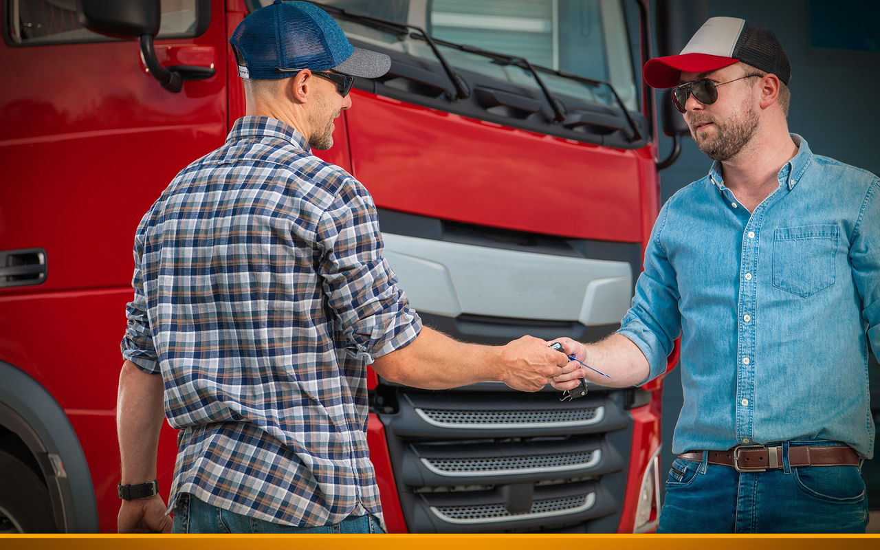 truck drivers exchange trucks