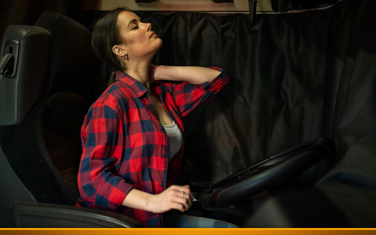 female truck driver has back and neck pain