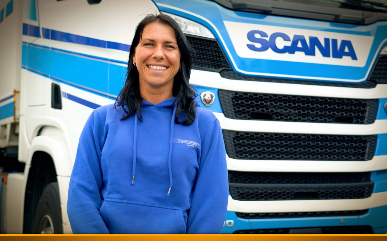 truck driver in front of truck