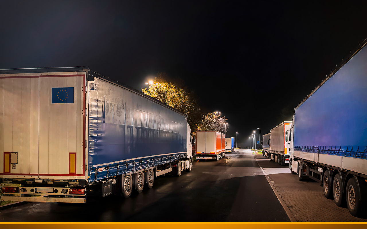Parking lot overcrowded with trucks