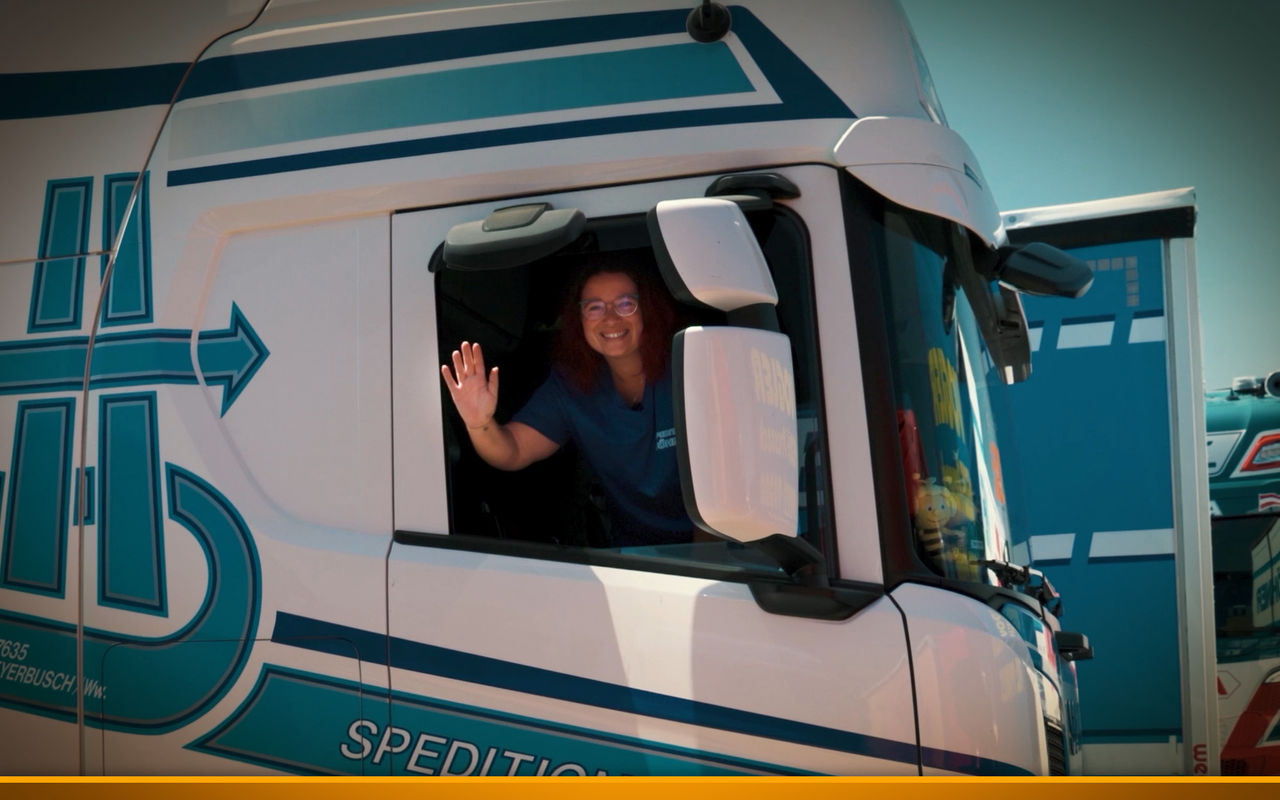 Trucker "Biene" from the Höhner freight company in her truck.