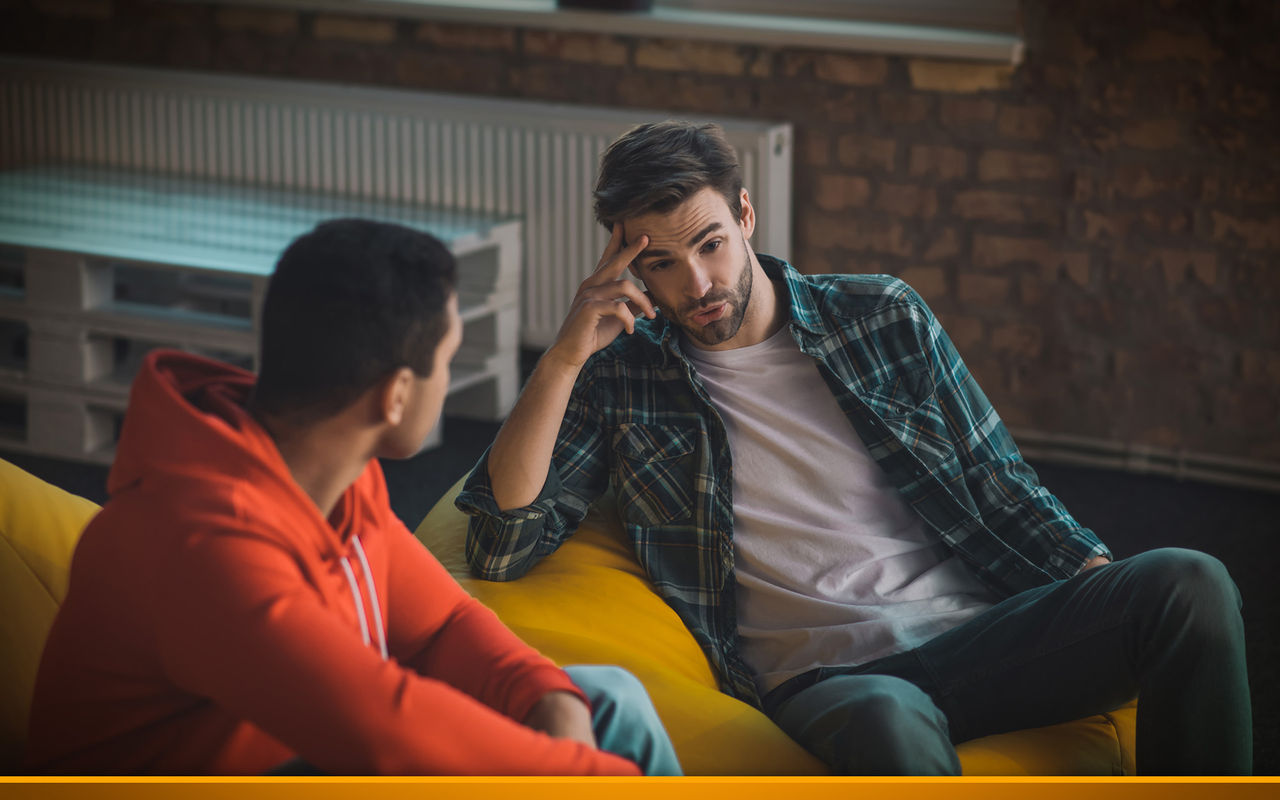 two men talking seriously