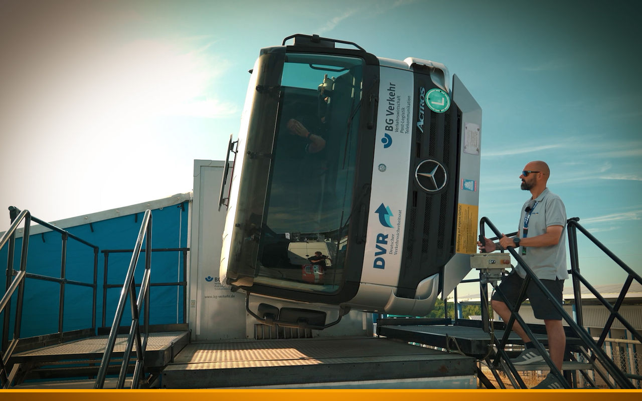 trucker Tinka in the rollover simulator at the Truck Grand Prix