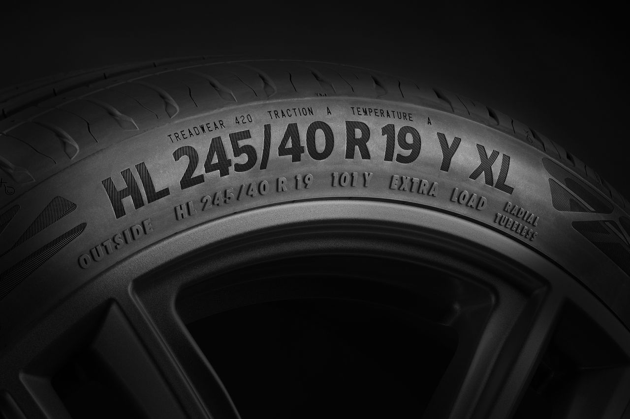 Reinforced1 Close-up of a reinforced tire sidewall showing XL Extra Load marking